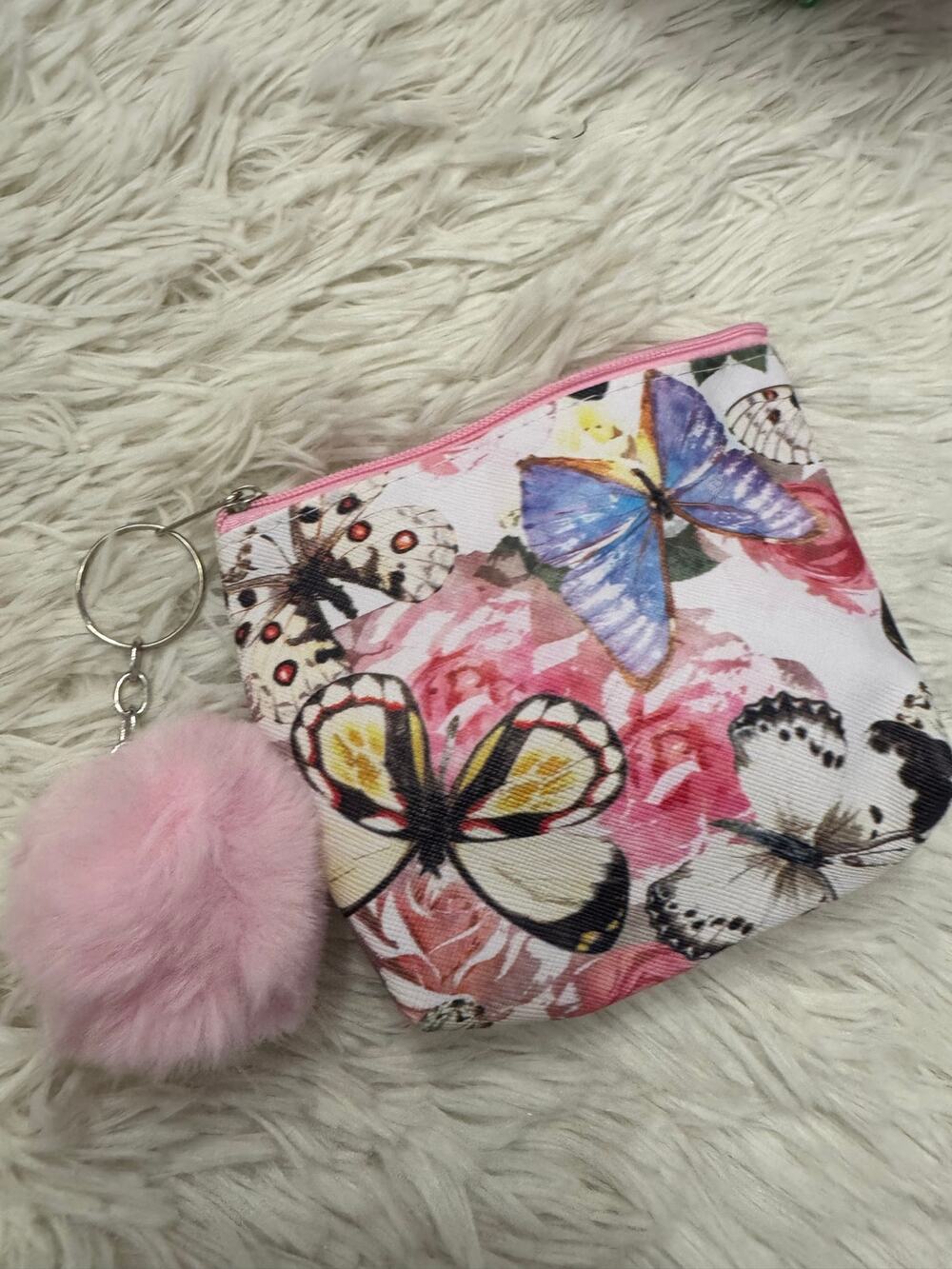 Pink and white butterfly keychain coin purse with pink pom pom